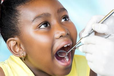 young girl getting dental care at Sycamore Family Dentistry